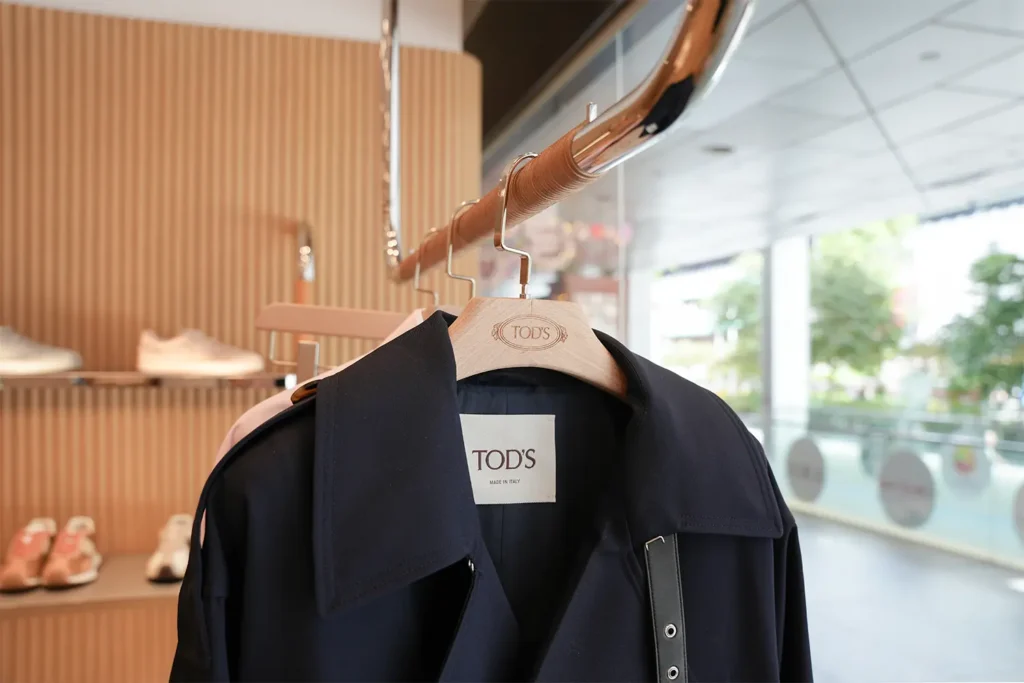 Tod's Pop-Up Boutique Commercial and Retail Fit-Out Footwear Shoes Clothes Outerwear Jacket Shelving Fixtures